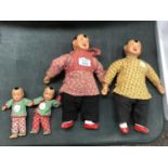 A FAMILY OF FOUR CHINESE REPUBLIC PERIOD DOLLS WITH WOODEN HEADS AND FEET