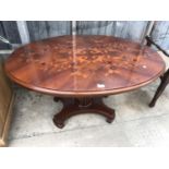 A FLAME MAHOGANY FLORAL DESIGN COFFEE TABLE