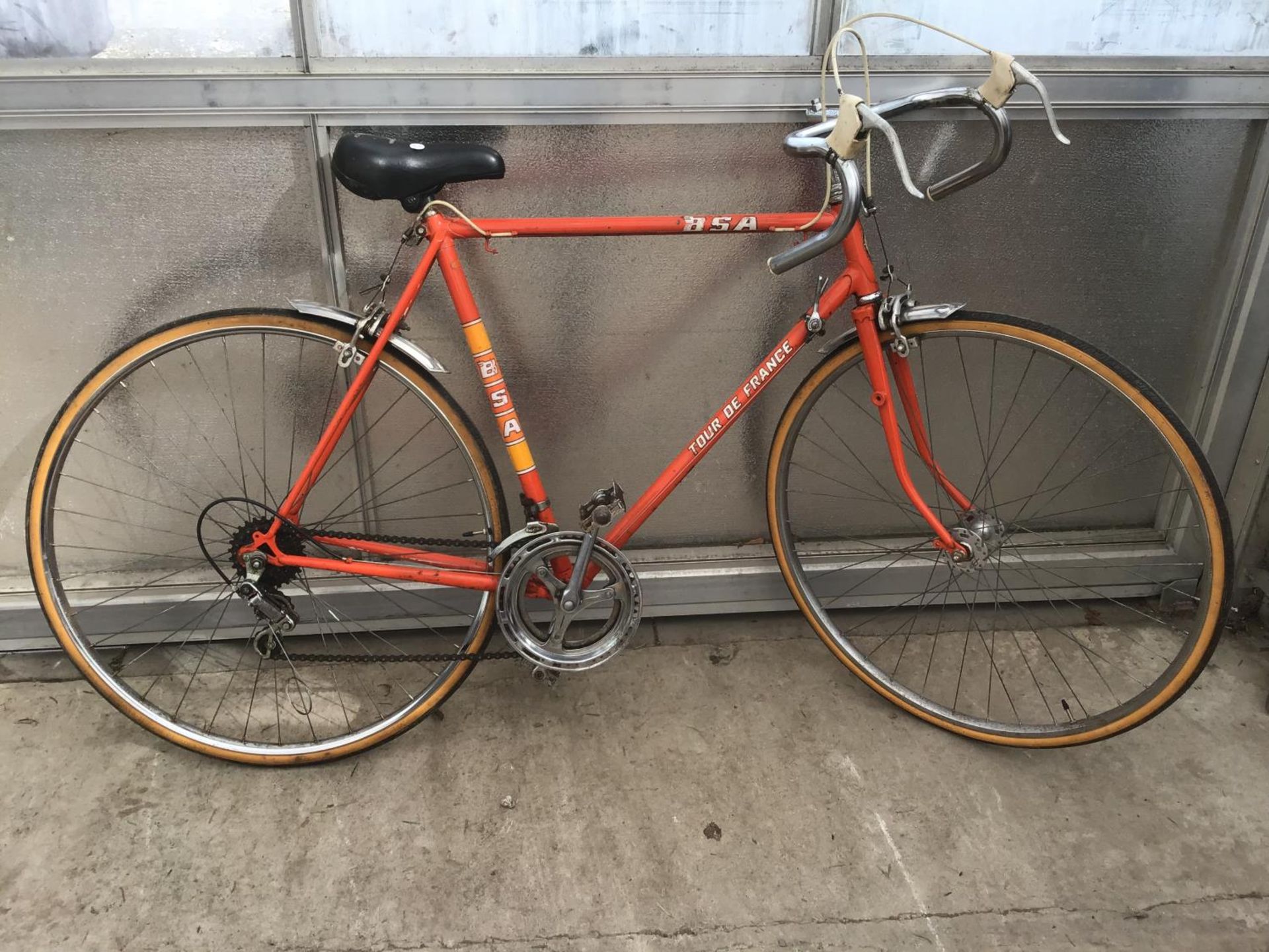 A VINTAGE BSA TOUR DE FRANCE DROP HANDLED RACING BIKE WITH NEW TYRES AND INNER TUBES AND A TEN SPEED