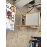 A CHILDS EASEL WITH WHITEBOARD AND BLACKBOARD WITH CHALKS ETC