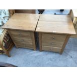 TWO MODERN OAK BEDSIDE CHESTS OF THREE DRAWERS