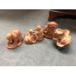 A GROUP OF FOUR BOXWOOD JAPANESE NETSUKE FIGURES