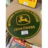 A CAST IRON 'JOHN DEERE' SIGN