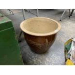 A LARGE CERAMIC PLANT POT