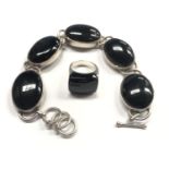 A LADIES .925 SILVER NECKLACE AND RING SET WITH BLACK ONYX SET STONES