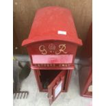A RED G & R VICTORIAN STYLE POST BOX WITH KEYS