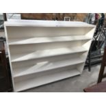 TWO WHITE FOUR TIER BOOKCASES