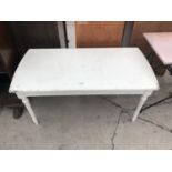 A WHITE COFFEE TABLE