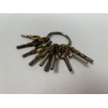 A SET OF TEN POCKET WATCH KEYS