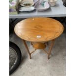 A SATINWOOD INLAID OVAL SIDE TABLE WITH LOWER SHELF