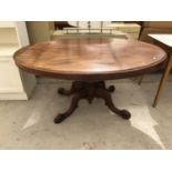 A VICTORIAN OVAL MAHOGANY LOO BREAKFAST TILT TOP TABLE