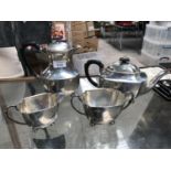 A SHEFFIELD HALLMARKED SILVER TEA SET COMPRISING TEA POT, COFFEE POT, MILK JUG AND SUGAR BOWL, DATED