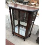 A MAHOGANY MIRRORED BACK CHINA CABINET ON CABRIOLET SUPPORTS