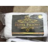 TWO PACKS OF HOTEL PILLOWS (TWO PILLOW PER PACK)