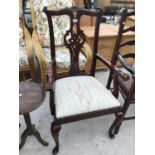 A CARVED MAHOGANY CARVER ARMCHAIR