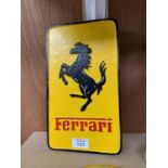 A CAST 'FERRARI' SIGN