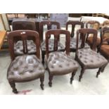 A SET OF SIX MAHOGANY DINING CHAIRS WITH LEATHER BUTTON UPHOLSTERED DESIGN