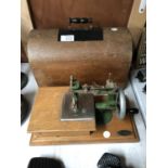 A VINTAGE MINIATURE 'GRAIN' SEWING MACHINE