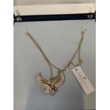 A BOXED SILVER GILT EAGLE NECKLACE