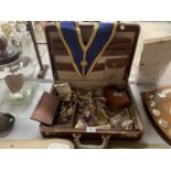 A VINTAGE SUITCASE AND CONTENTS, INCLUDING COSTUME JEWELLERY, SASH ETC