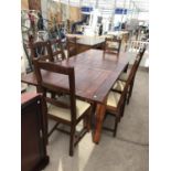 A MODERN GOOD QUALITY INDONESIAN WOOD DINING TABLE WITH SIX DINING CHAIRS