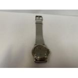 A GENTS CALVIN KLIEN WRIST WATCH WITH CHROME STRAP