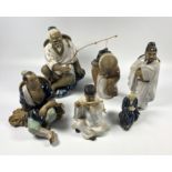 A GROUP OF FIVE VINTAGE STONEWARE CHINESE POTTERY FIGURES, HEIGHT OF LARGEST INCLUDING ROD 15.5CM