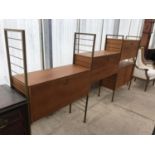 A STAPLES LADDERAX RETRO TEAK UNIT WITH FOUR CABINETS - THREE FALL DOWN AND ONE WITH SLIDING PANELS