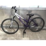 A TREK 3700 MOUNTAIN BIKE WITH A 21 SPEED SHIMANO GEAR SYSTEM
