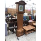 A BRASS FACED FEARNLEY OF WIGAN CASED GRANDFATHER CLOCK WITH WEIGHT AND PENDULUM