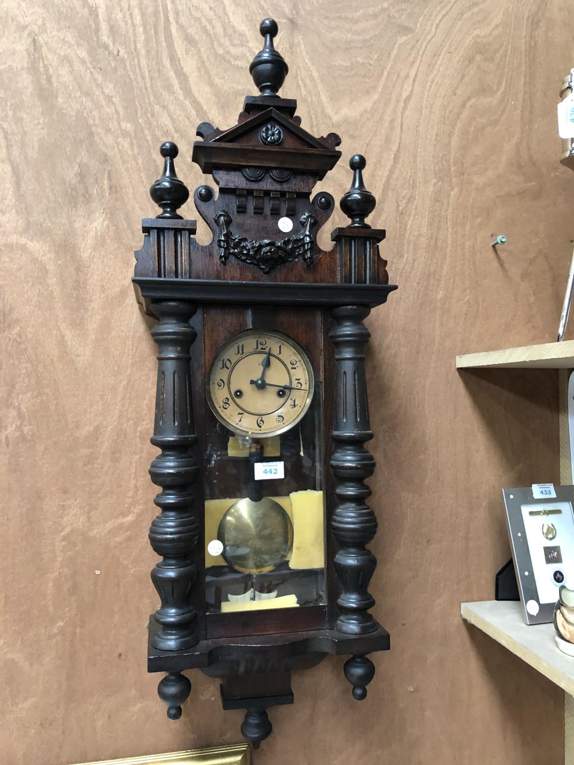 A MAHOGANY CASED VIENNA STYLE WALL CLOCK WITH PENDULUM AND KEY, WORKING