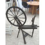 A VINTAGE SPINNING WHEEL