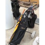 A JOHN LETTER SET OF GOLF CLUBS ON A TROLLEY WITH ACCESSORIES