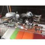 A LARGE COLLECTION OF PANS, BAKING DISHES, FLATWARE ETC