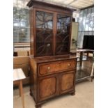 A 19TH CENTURY MAHOGANY SECRETAIRE BOOKCASE WITH FALL FRONT AND UPPER GLAZED DOORS