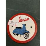 A CAST VESPA SIGN