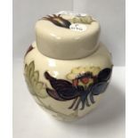 A LARGE MOORCROFT FLORAL PATTERN LIDDED GINGER JAR, HEIGHT 15CM