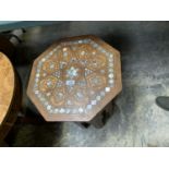 A OCTAGONAL TOPPED MIDDLE EASTERN STYLE TABLE WITH A MOTHER OF PEAR INLAY