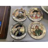 A SET OF FOUR ROYAL DOULTON SERIES WARE PLATES