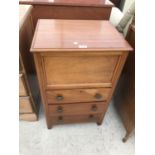 A MAHOGANY CHEST WITH FOLD UP TOP AND THREE DRAWERS