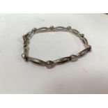 A SILVER LADIES BRACELET