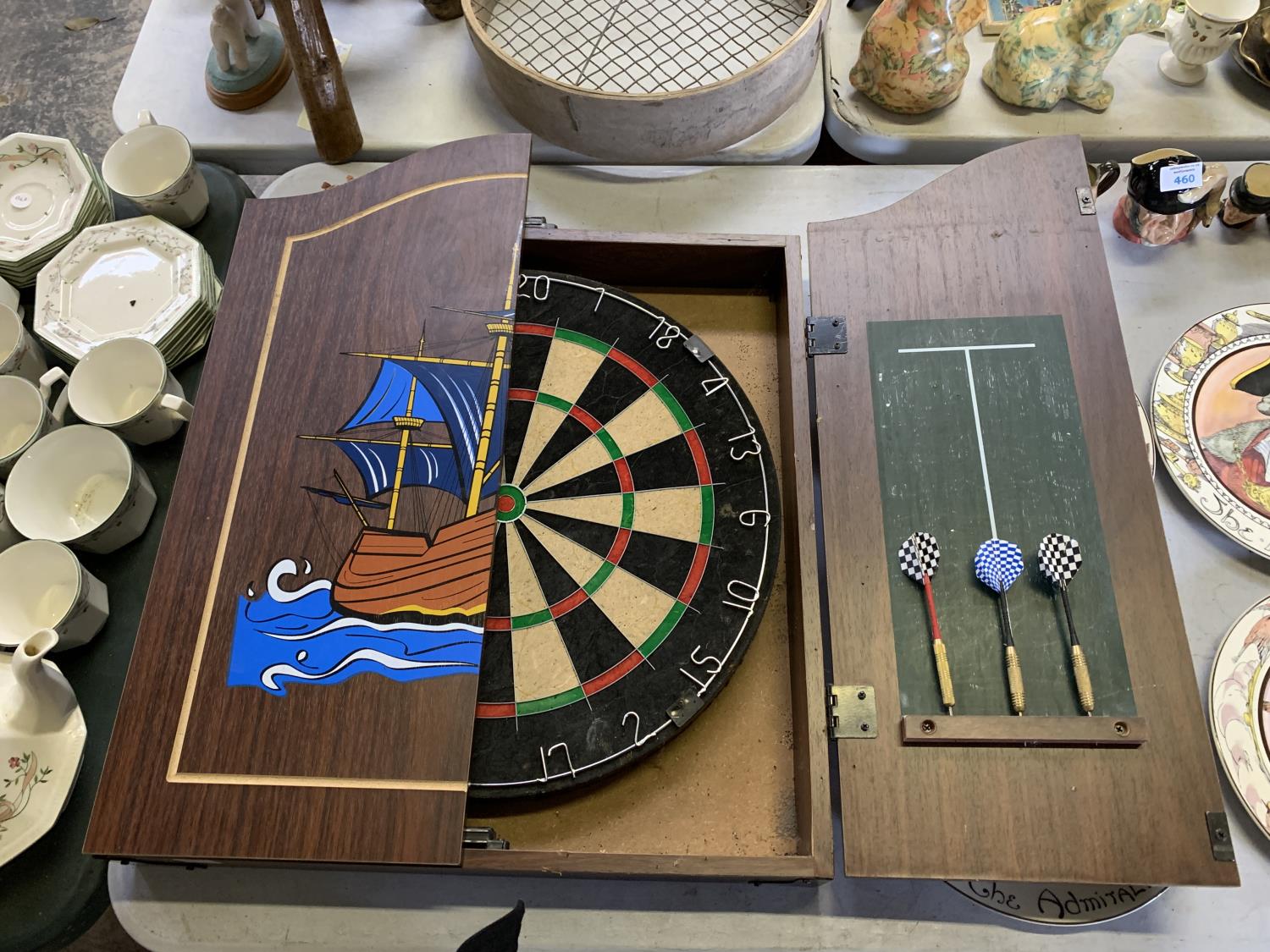 A DART BOARD SET IN WOODEN HOUSING - Image 2 of 2