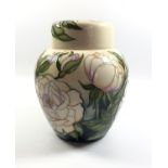 A MOORCROFT POTTERY 'MADAME' PATTERN LIDDED GINGER JAR, HEIGHT 16CM