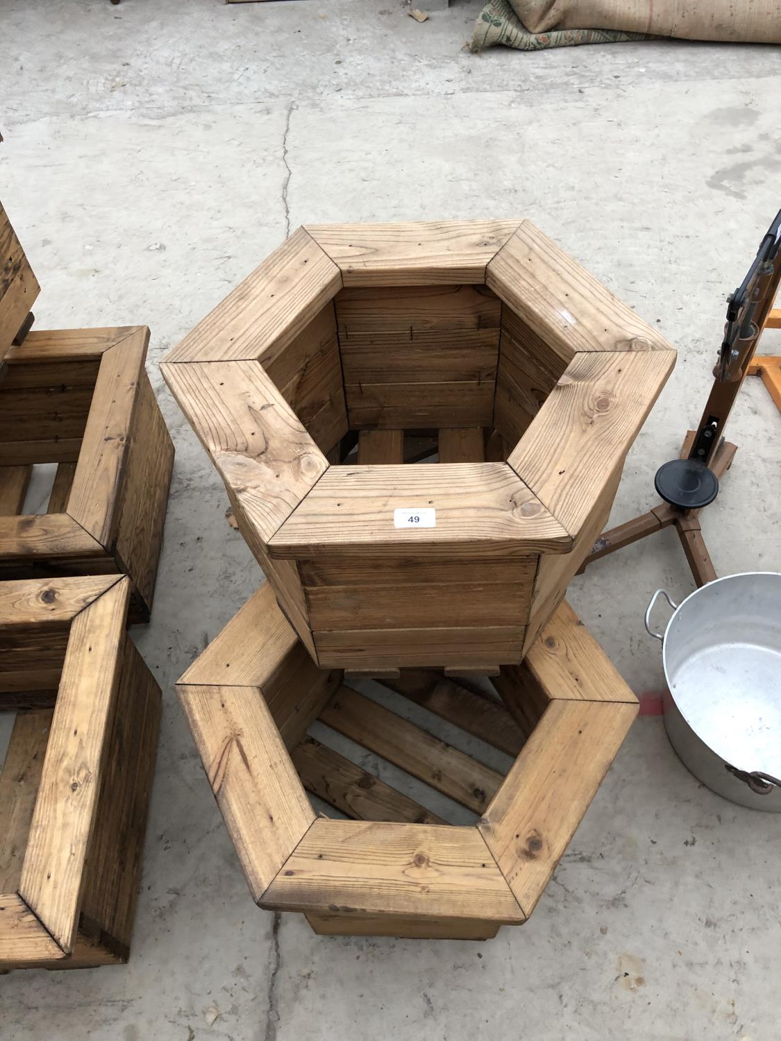 THREE WOODEN GARDEN PLANTERS