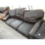 A BROWN LEATHER THREE SEATER SOFA