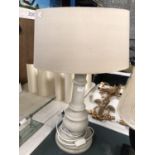 A STONE EFFECT STYLE LAMP BASE AND SHADE