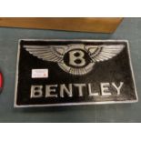 A BLACK AND CHROME BENTLEY WALL PLAQUE