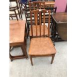 A PAIR OF TEAK DINING CHAIRS