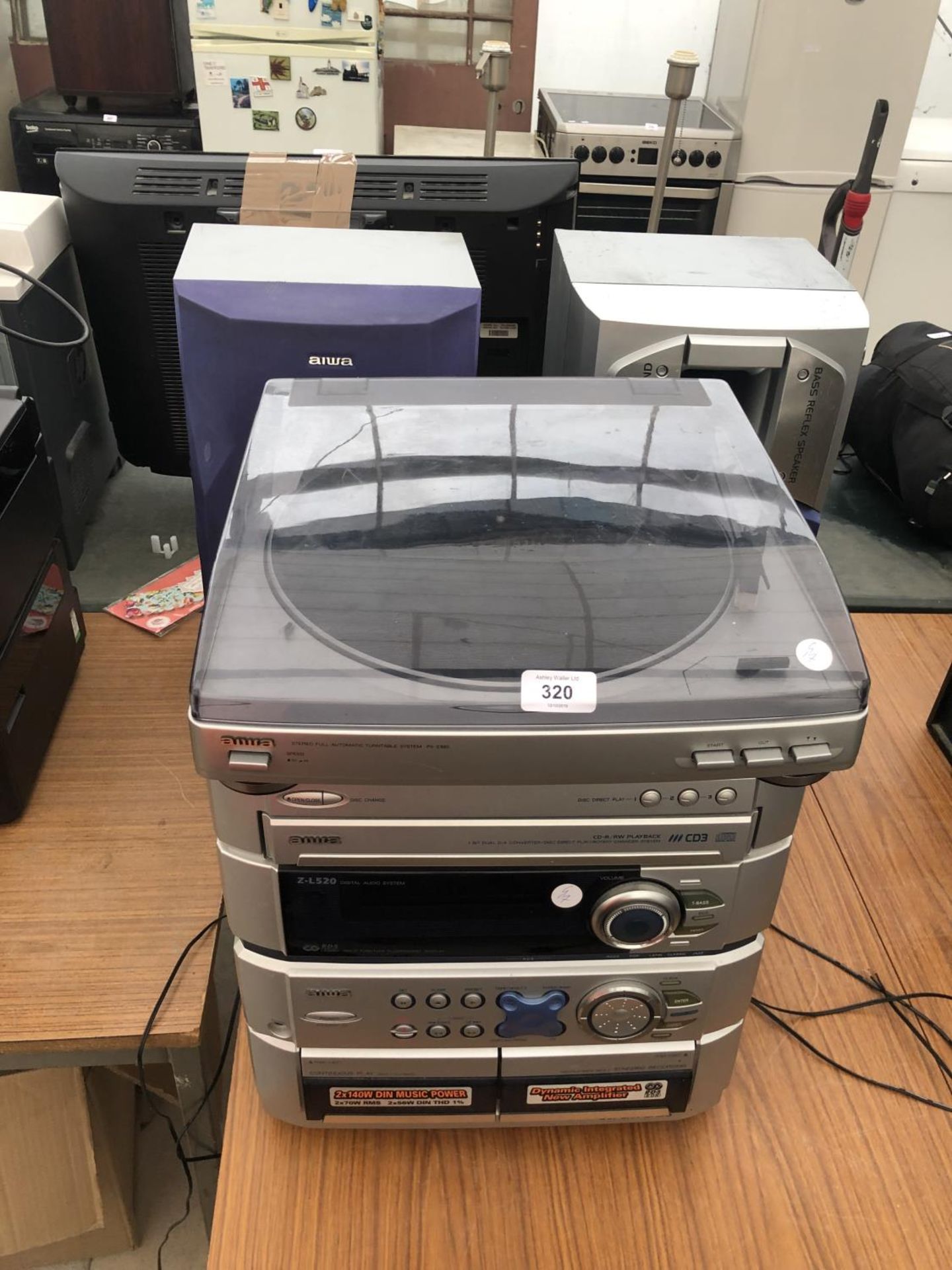 A CD AND RECORD PLAYER IN WORKING ORDER