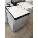 A UNDER COUNTER HOTPOINT FRIDGE